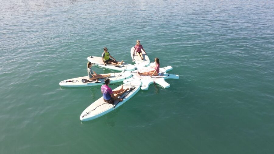 Arguineguín: Stand-up Paddleboard Yoga Class with Instructor - Equipment, clothing, and the slippery-board warning