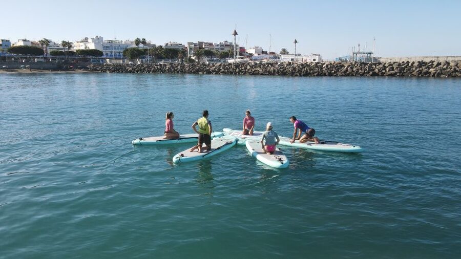 Arguineguín: Stand-up Paddleboard Yoga Class with Instructor - A small group changes the feel