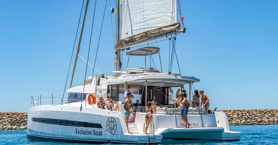 Gran Canaria: Catamaran Day Trip with Food and Drinks - Setting out from Puerto Rico toward the wild southwest coast