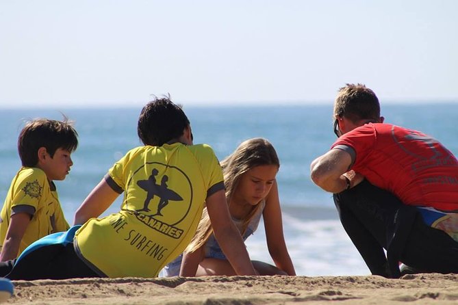 Small-Group Surf Lessons in Gran Canaria - Carrying the board is part of the morning